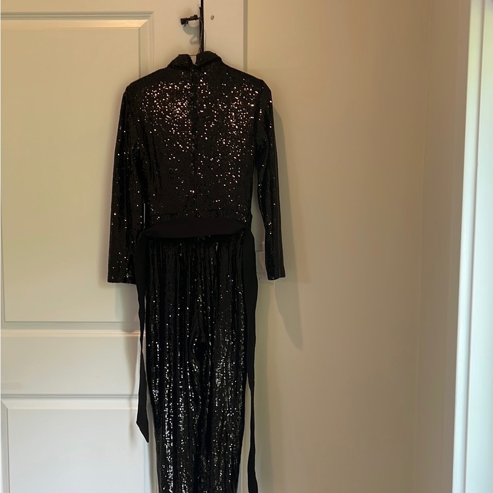 A sequence jumpsuit black.    Very elegant, great for a wedding, party or date.
